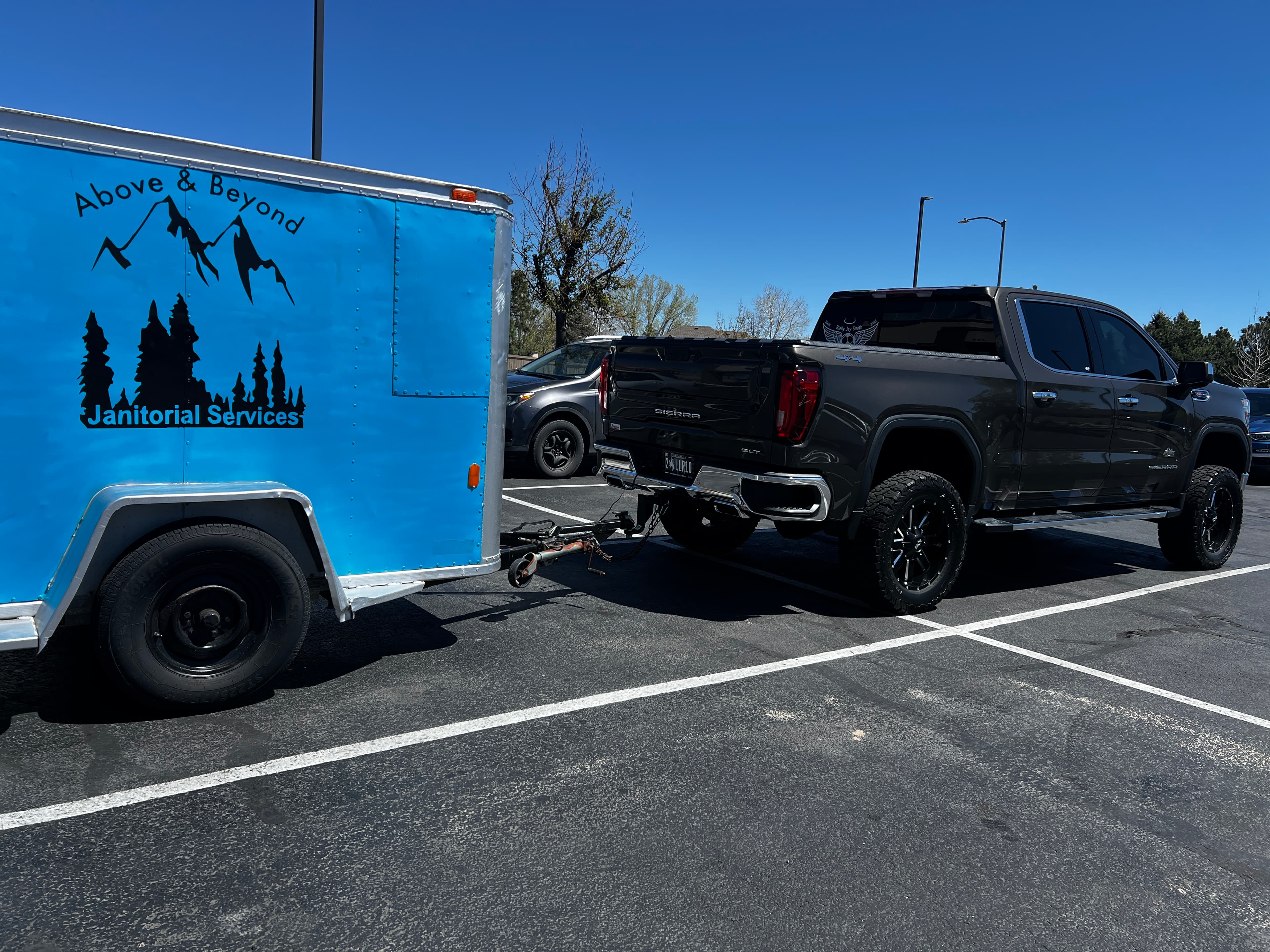 Above & Beyond Janitorial Services truck and trailer